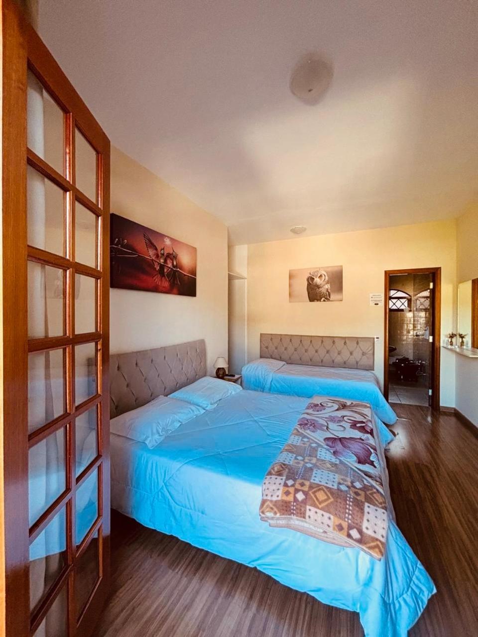 Quarto Triplo com Banheiro